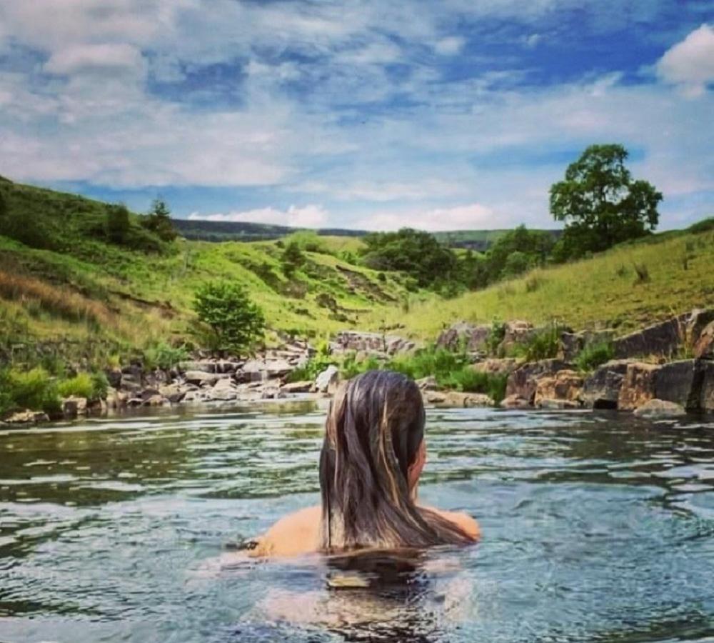 Wild swimming in Cwmparc - Picture by Carly Davies