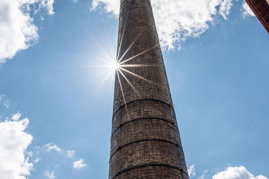 The chimney stands hundreds of feet tall