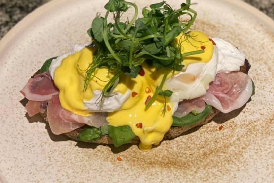 Avocado and poached egg brunch at Trattoria